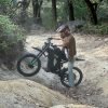 freego-x3-electric-dirt-bike-forested-rock-gully Freego X3 / X3 Pro 72V 40Ah/50Ah 8000W Off-Road Electric Dirt Bike